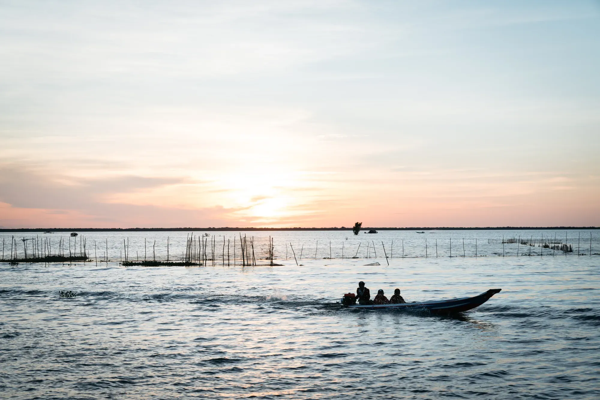 Sunset over Tonle Sap Lake from a boat