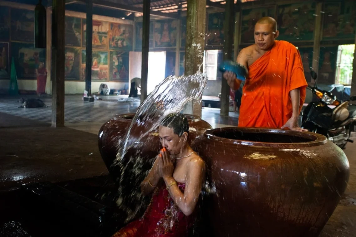 A monk gives a water blessing at the Kompong Khleang pagoda