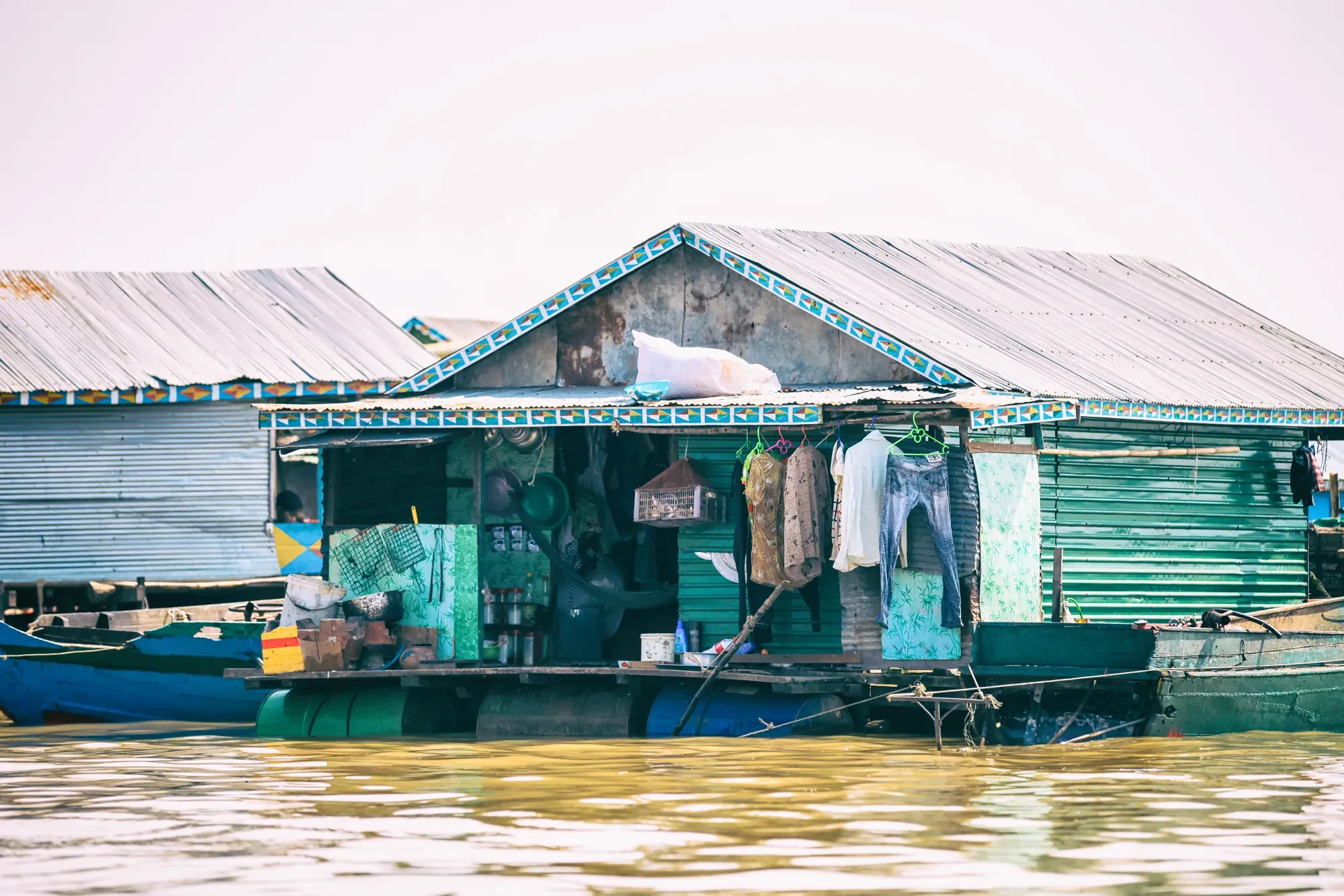 A blue floating house on Tonle Sap Lake