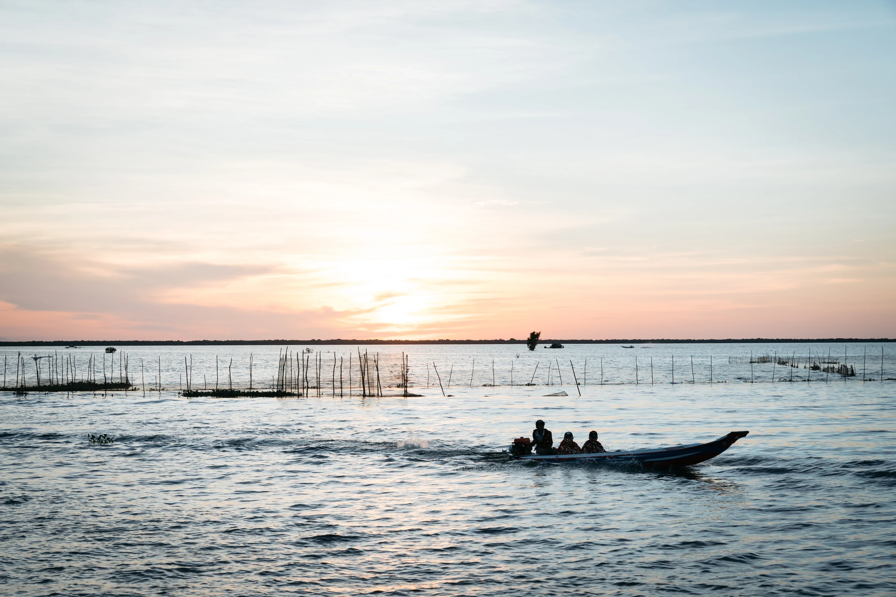 Sunset over Tonle Sap Lake from a boat
