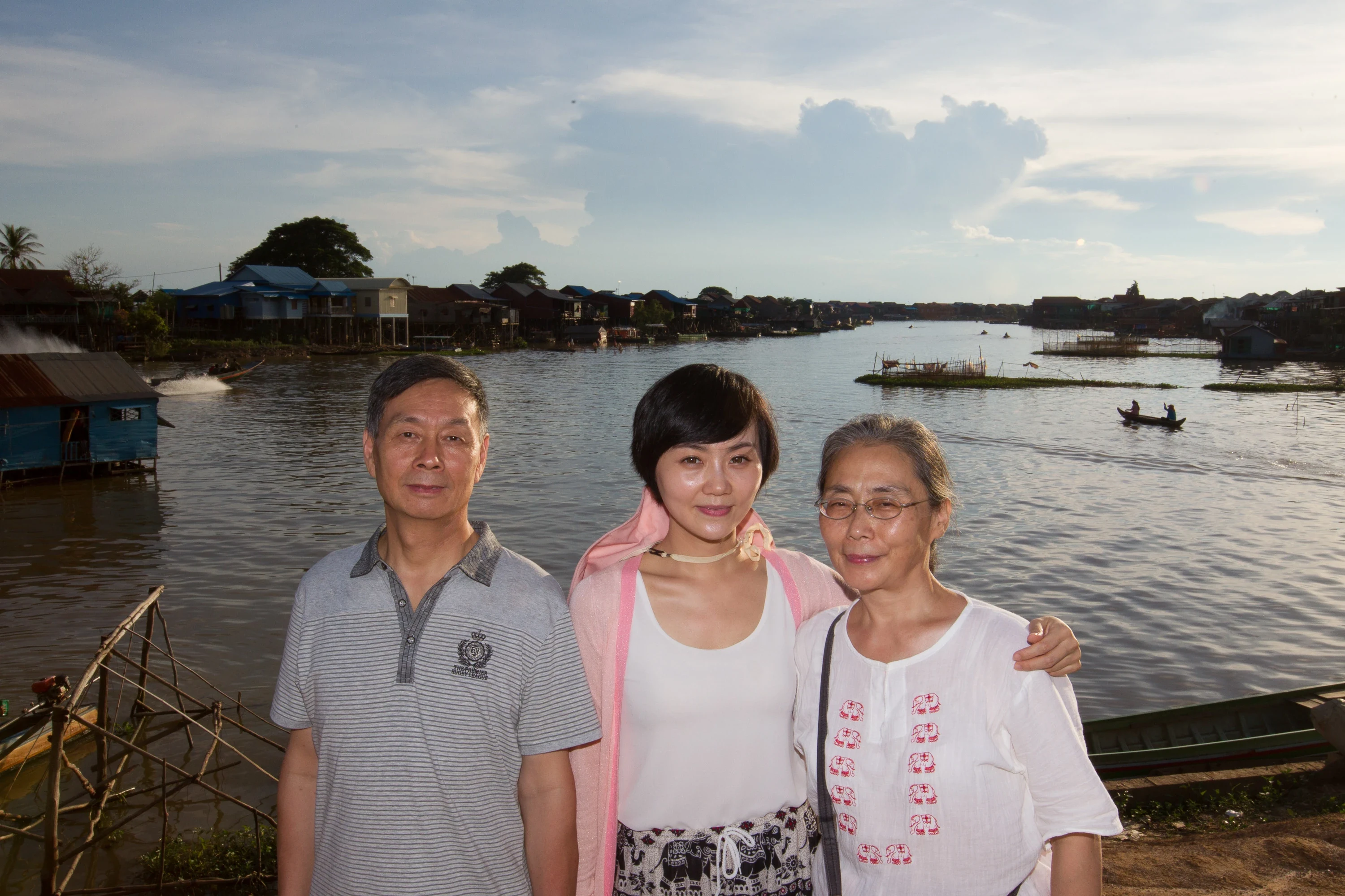 A family on the boat on Tonle Sap Lake
